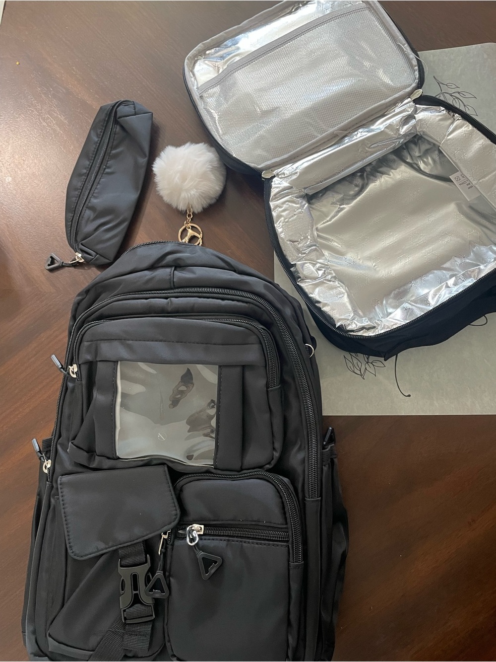 Black Men's Multi-Pocket Utility Backpack with Pom Keychain